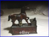 1885 Cast Iron Mechanical Bank trick pony nice original paint original one owner