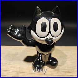 8 1/2 Antique Style Painted Black Cast Iron Felix Coin Bank