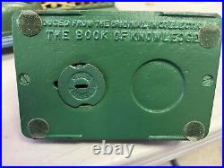 9 cast iron banks book of knowlege good condition
