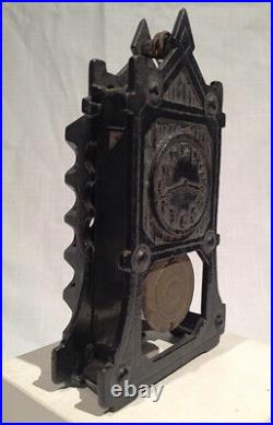 ARCADE IRON CLOCK STILL BANK with MOVABLE PENDULUM, C. 1923, ALL ORIGINAL