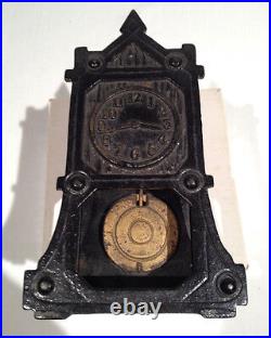 ARCADE IRON CLOCK STILL BANK with MOVABLE PENDULUM, C. 1923, ALL ORIGINAL