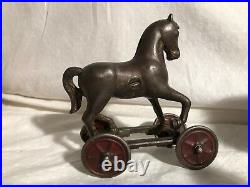 A. C. WILLIAMS HORSE on WHEELS cast iron BANK Pull Toy