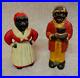 Americana_Cast_Iron_Coin_Piggy_Banks_Set_of_2_Man_Woman_01_df
