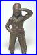 Antique_1915s_Hubley_Indian_with_Tomahawk_Cast_Iron_Coin_Still_Bank_6in_Tall_01_xn