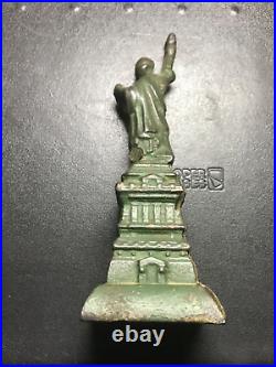 Antique A. C. Williams Cast Iron Gold Colored Statue of Liberty Still Penny Bank