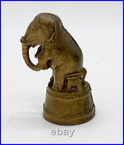 Antique A. C. Williams cast iron seated circus elephant still bank