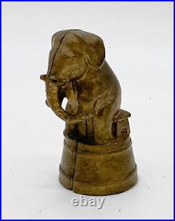 Antique A. C. Williams cast iron seated circus elephant still bank