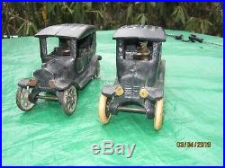 Antique Arcade cast iron toy model T banks with advertising on roof