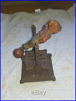 Antique Cast Iron Mechanical Bank Boy On Trapeze