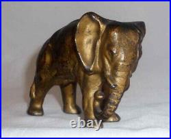 Antique Cast Iron Still Penny Bank Elephant with Tucked Trunk by Arcade US