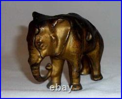 Antique Cast Iron Still Penny Bank Elephant with Tucked Trunk by Arcade US