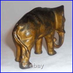 Antique Cast Iron Still Penny Bank Elephant with Tucked Trunk by Arcade US