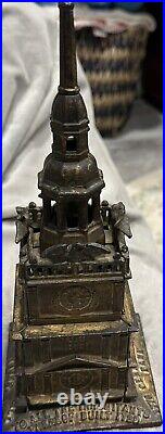 Antique Cast Iron Tower Still Coin Bank