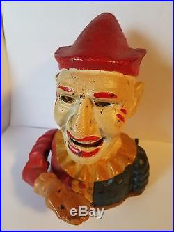 Antique Cast Iron Toy Bank Jester Clown In Original Condition. Price Reduced
