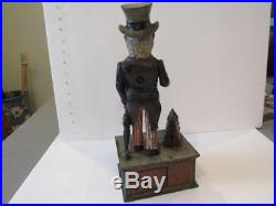 Antique Cast Iron Uncle Sam Mechanical Bank by Shepard Hardware cir. 1886