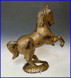 Antique Figural Cast Iron Prancing Horse on Oval Base Still Penny Bank, 1920s