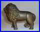 Antique_Gold_Colored_Cast_Iron_Still_Penny_Bank_Standing_Lion_With_Tail_Right_01_nnn