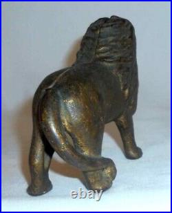 Antique Gold Colored Cast Iron Still Penny Bank Standing Lion With Tail Right