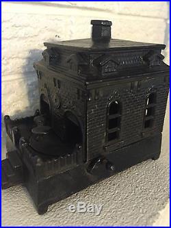 Antique H. L. Judd Cast Iron House Mechanical Bank with Revolving Dog circa1890