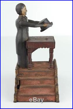 Antique Original c. 1906 J&E Stevens Magician Mechanical Cast Iron Bank Working