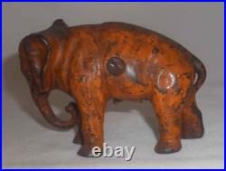 Antique Painted Cast Iron Still Penny Bank Elephant with Tucked Trunk by Arcade US Antique Painted Cast Iron Still Penny Bank Elephant with Tucked Trunk by Arcade US