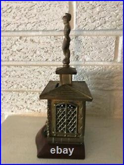 Antique Scarce Rare Brass and wood House Still Bank with Knight finial Figure