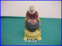Antique old Cast Iron Mechanical Funny clown on Globe Bank J&E Stevens Co