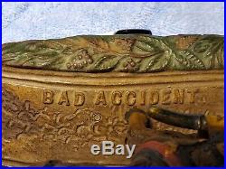 Bad Accident Mechanical Cast Iron Bank. Original. Not a reproduction. Late 1890