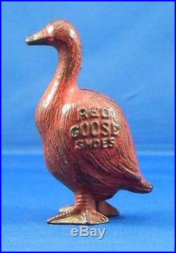 CAST IRON STILL BANK RED GOOSE SHOES BY ARCADE CIRA 1920