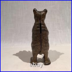 CIRCA 1920's ORIGINAL BEAR STEALING PIG CAST IRON STILL BANK