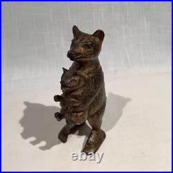 CIRCA 1920's ORIGINAL BEAR STEALING PIG CAST IRON STILL BANK