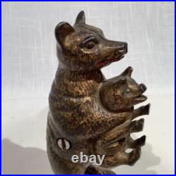 CIRCA 1920's ORIGINAL BEAR STEALING PIG CAST IRON STILL BANK