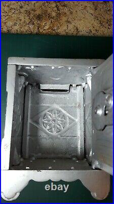 C. 1897 J. E. Stevens Safe Deposit Coin Combination Still Bank Cast Iron Nickel