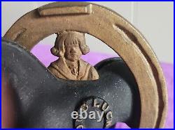 C. 1908-32 Arcade Good Luck Horseshoe (Buster Brown & Tige) Cast Iron Bank