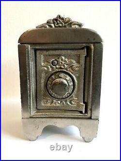C. 1911 Kenton Toys Cast Iron Angel Nickel Plated Combination Dial Bank NICE
