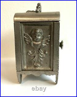 C. 1911 Kenton Toys Cast Iron Angel Nickel Plated Combination Dial Bank NICE