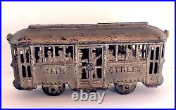 C. 1920's A. C. Williams Main Street Trolley (with People) Cast Iron Bank NICE