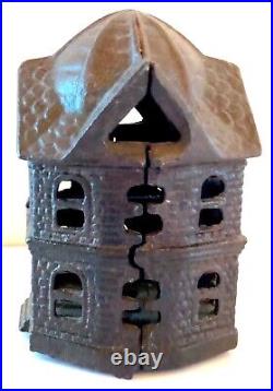 C. Early 1900's Two Story (Six Sided) House Cast Iron Bank Pristine Cond