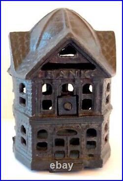 C. Early 1900's Two Story (Six Sided) House Cast Iron Bank Pristine Cond