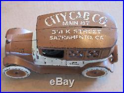 Cast Iron Arcade Taxi Cab Bank Brown and White Private Label VG+
