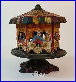 Cast Iron Carousel Bank with Patent date of Feb 2 1875 on bottom cast iron plug
