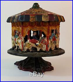 Cast Iron Carousel Bank with Patent date of Feb 2 1875 on bottom cast iron plug