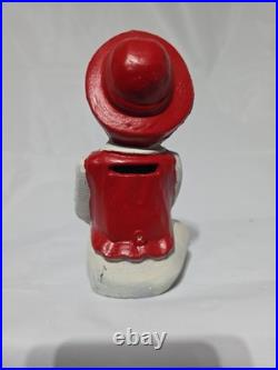 Cast Iron Coin Bank Sitting Girl