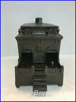 Cast Iron Dog on a Turntable Mechanical Bank- H. L. Judd Co. 1895