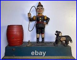 Cast Iron Mechanical Bank Vintage Trick Dog with Clown Solid Base by Hubley 1910s