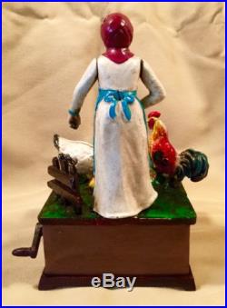 Cast Iron Musical Lady Feeding The Chickens Mechanical Coin Piggy Bank