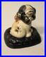 Cast_Iron_Puppo_Puppy_Dog_on_a_Pillow_Toy_Coin_or_Penny_Bank_1914_Hubley_01_oe