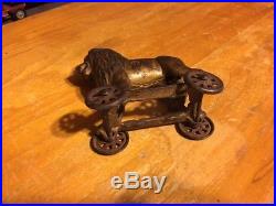 Early 1900's Cast Iron Lion Bank on Wheels Rare