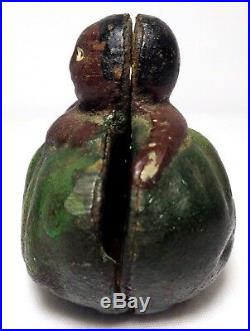 Early 20th C Black Americana Painted Cast Iron Bank Of Boy Straddling Watermelon