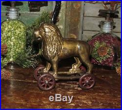 Early Antique Vtg Cast Iron A C Williams Arcade Lion on Wheels Coin Penny Bank